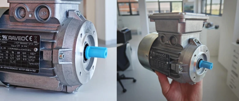 Detailní pohled na průmyslový elektromotor s viditelnými komponentami.