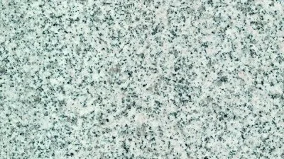 Detail textury dlažby z granulitového kamene pro schody.