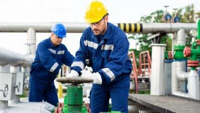 Workers with ppe at industrial site