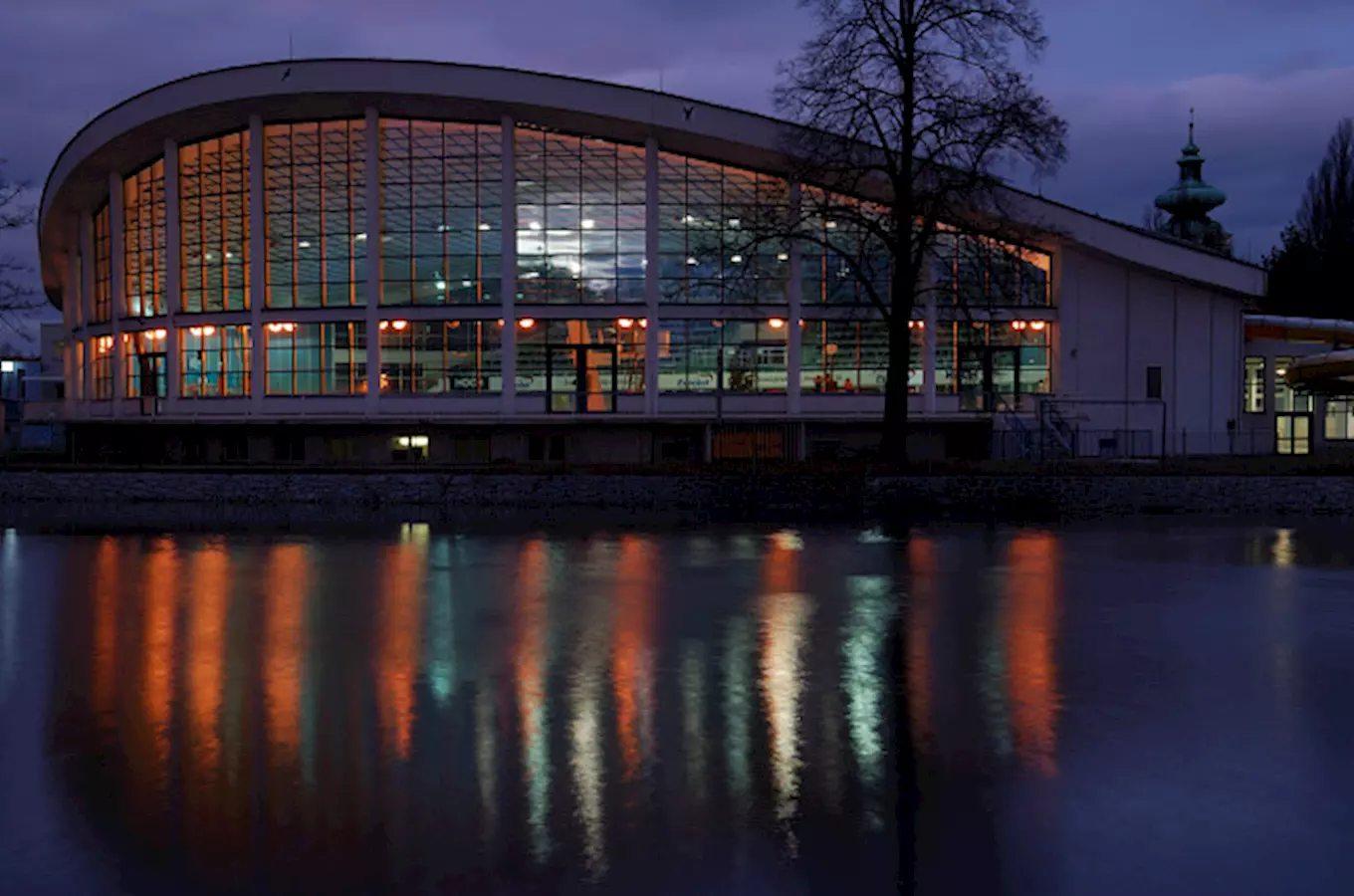 Swimming pool building at dusk