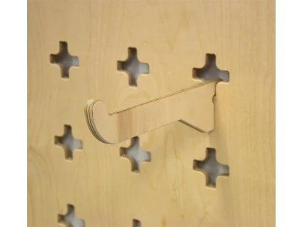 Wooden pegboard with tool holder