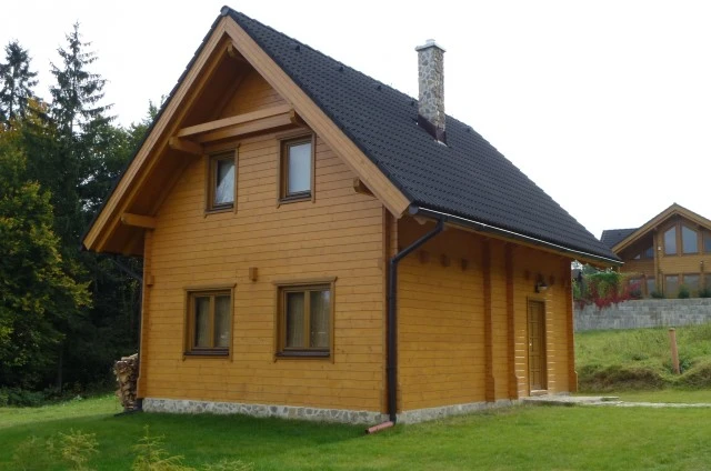 Two-story wooden chalet house