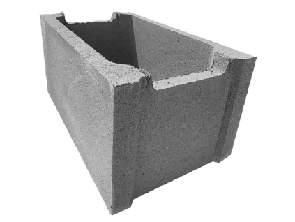 Concrete formwork block with rebar slots