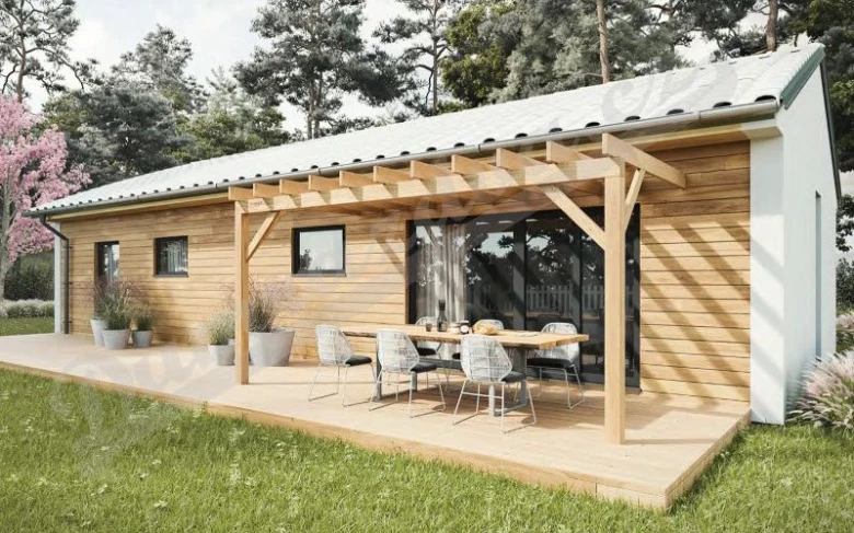 Modern dřevěný montovaný bungalov s terasou pro venkovní oběd.
