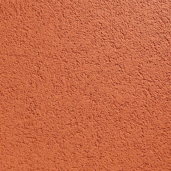 Textured orange plaster wall