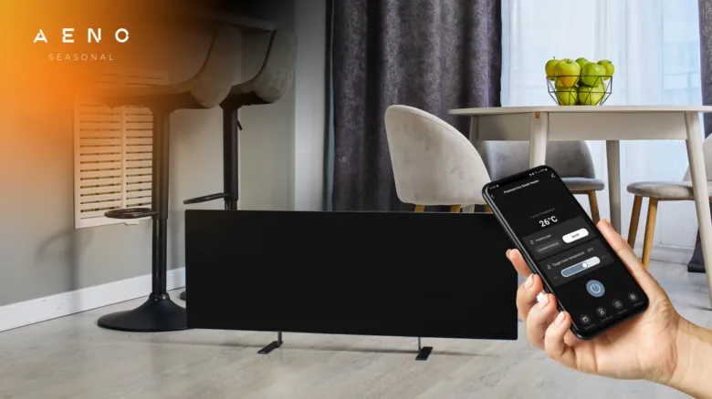 Smartfon ovládající infra panel v interiéru